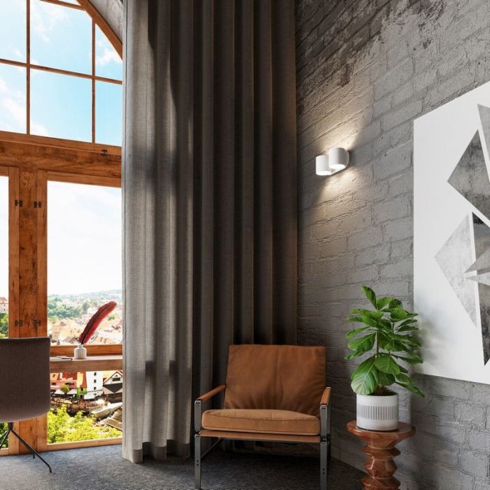 Witte up down wandlamp Amely, aluminium